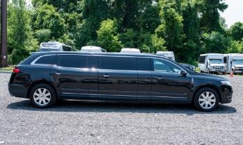 Black SUVs on a highway