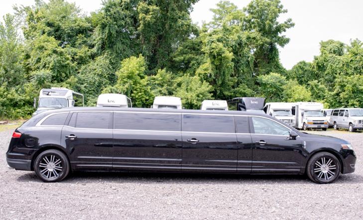 Black SUVs on a highway