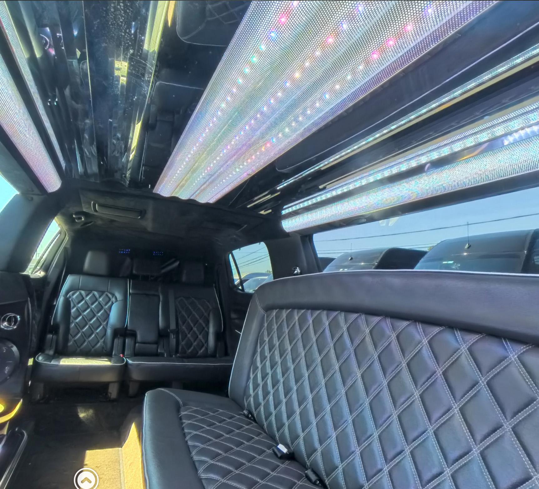 Black SUVs on a highway